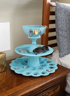 a blue tray with sunglasses on it and the words how to simple 3 tier jewelry organizer