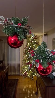 two christmas decorations hanging from the ceiling