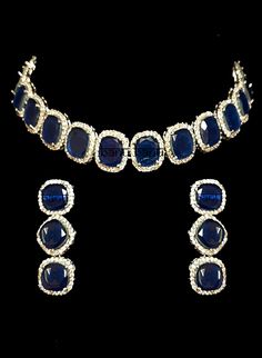 "Best Seller! Patil I - Modern Kundan Bridal Set with Blue Onyx Stone Indian bridal set makes every bride's outfit perfect. This royal blue onyx is further accented with tiny Kundan gems all around making it exquisite. Beautiful gemstones adorn this necklace choker.  This jewelry set is sure to make you stand out from the crowd. This necklace set comes along with a beautiful pair of hanging earrings with blue Onyx & Kundan gems to match. Our Bridal collection is handmade with love & care. It mak Luxury Blue Kundan Necklace, Luxury Blue Kundan Necklace As Gift, Blue Necklace Indian, Kundan Bridal Set, Minimal Choker, Blue Choker, Beautiful Gemstones, Kundan Set, Blue Onyx