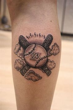 a baseball tattoo on the leg with clouds and bats