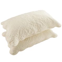 two pillows sitting on top of each other