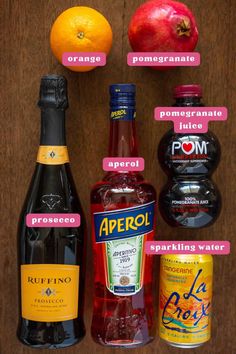 an assortment of different types of alcohol on a wooden table with labels describing the ingredients