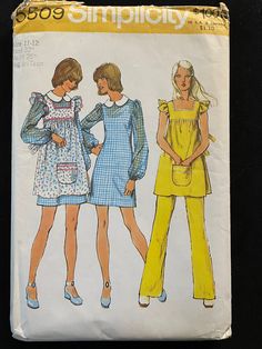 "This is a Simplicity pattern for a Smock, Mini-Dress and Pants: The mini-dress with contrasting collar has a back zipper, high round neckline and long set-in sleeves gathered with elastic casings. The smock with skirt gathered to yoke has back button closing, low square neckline, short ruffle type sleeves, tie ends and embroidered braid or ribbon or novelty bias tape trim. The pants have back zipper and elastic waistline casing. Size 11-12 Bust 32\" Pattern is uncut and factory folded NOTE: We 1970 Fashion, 70s Patterns, Superstar Barbie, 1970s Sewing Patterns, Vintage Mini Dresses, 1970's Fashion, 9th Grade, 1970s Fashion, Patterns Sewing