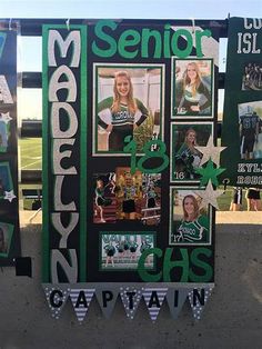 a sign with pictures and words on it in front of a fence at a football field