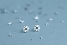 Limited winter collection: small snowflakes earrings with zircon of different colors, simple and elegant. Please select color of gemstone during order, thank you!Great start for coming winter season!Perfect Christmas gift for you wife or girlfriend.Looks perfect in set with our snow necklace:https://www.etsy.com/listing/575949247/ - Snowflake necklaceDetails:- width 10 mm- material: silver 925Please read my shipping and policies tab for shipping info. All items are packaged in moisture resistant Elegant Winter Gift Earrings, Elegant Snowflake Earrings For Winter, Cubic Zirconia Snowflake Earrings For Gift, Winter Snowflake Earrings For Gifts, Snowflake Earrings For Winter Gift, Xmas Ring, Snow Necklace, Small Snowflakes, Snow Earrings