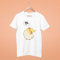 Cute T-Shirt for all cockatiel lovers and a great gift idea for any birb lover! If you would like to have a normal grey, albino or white faced cockatiel on this t-shirt instead of the lutino - write me a message! This classic unisex jersey short sleeve tee fits like a well-loved favorite. Soft cotton and quality print make users fall in love with it over and over again. These t-shirts have-ribbed knit collars to bolster shaping. The shoulders have taping for better fit over time. Dual side seams Kawaii Short Sleeve Pre-shrunk T-shirt, Kawaii Pre-shrunk Short Sleeve T-shirt, Cute Cockatiel, Kawaii Tshirt, Kawaii T Shirt, Cute Graphic Tees, Cute Tshirts, Cute Shirts, Tshirt Colors