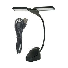 a desk lamp with a charger attached to it