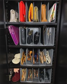 a shelf filled with lots of different types of shoes