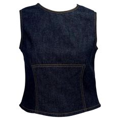 Presenting a sleeveless denim Gucci top designed by Tom Ford. From the Spring/Summer 2000 collection, this denim top is fashioned with beige stitching, accentuating the female form. An excellent and chic Y2K piece, this versatile top will become a closet staple. Approximate measurements: Size - IT42 Bust: 33” Waist: 29” Shoulder to hem: 18” Gucci Blouse, Tom Ford For Gucci, 1990 Style, Functional Wardrobe, Gucci Top, Denim Shorts Outfit, Summer Shorts Outfits, Fancy Tops, Crop Top Shirts