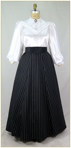 "Linen/Cotton. Color: Black and white. Medium weight yarn dyed pinstripe black and white stripe linen blend woven fabric with a graceful drape. Victorian style skirt cut in 3 gore style for the silhouette of the period. Comfortable matching black and white stripe elastic waistband. Total circumference approx. 94\"' at hemline. Wide variety of sizes and lengths. Dry clean. Circa 1890-1905. Made in U.S.A. Sizes: SM, MED, LG, XLG & 2XLG. Size Assistance for Elastic Waist Skirt: SM fits up to 26\" w Diy Victorian Dress, Elegant Striped Relaxed Skirt, Pleated Striped Skirt For Work, Striped Pleated Skirt For Work, Fitted Pinstripe Skirt For Work, Elegant Fitted Striped Skirt, Striped Pleated Fitted Skirt, Fitted Black Skirt With Vertical Stripes, Matilda Vibes