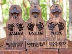 three wooden beer mugs with names on them