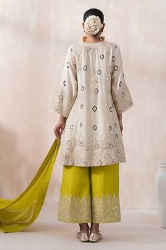 Beige kurta with thread embroidered floral swirl motifs, embellished by sequins on a tye-dye base. Comes with green palazzo and embroidered border dupatta. - Aza Fashions Bohemian Embroidered Silk Sharara, Semi-stitched Silk Sharara With Floral Embroidery, Semi-stitched Silk Embroidered Kurta, Semi-stitched Beige Palazzo Set With Straight Kurta, Semi-stitched Gold Embroidered Long Sleeve Kurta, Embroidered Semi-stitched Beige Palazzo Set, Beige Kurta, Kurta Palazzo Set, Jayanti Reddy