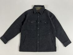 Wool Button-up Top For Winter, Wool Tops With Button Closure, Winter Wool Shacket With Button Closure, Winter Wool Tops With Spread Collar, Classic Winter Shacket With Button Closure, Winter Wool Button-up Shacket, Wool Button-up Shacket For Winter, Wool Outerwear With Buttons For Outdoor, Wool Long-sleeve Shacket With Button Closure