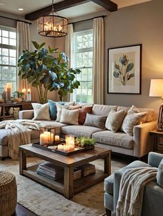 a living room filled with furniture and candles