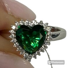 Questions? Leave A Comment Below! Heart-cut Emerald Ring For Formal Occasions, Heart Cut Emerald Ring For Formal Occasions, Luxury Green Heart Cut Rings, Green Heart Cut Emerald Ring For Formal Occasions, Heart Cut Green Emerald Ring For Formal Occasions, Formal Heart Cut Emerald Ring With Prong Setting, Formal Green Heart Cut Emerald Ring, Classic Green Heart Cut Rings, White Gold Heart Cut Emerald Ring