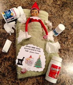 an elf's bed with toilet paper, toothpaste and other items on it