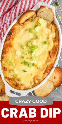 the cover of crazy good crab dip, with bread and vegetables in it on a table