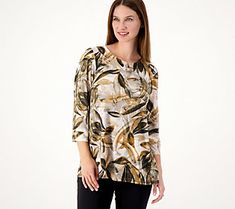 An eye-catching print, a flattering A-line silhouette, and shirring along the sleeves -- what's not to love about this beautiful blouse? Plus, the Liquid Knit® feels oh-so soft and comfy on your skin. From Susan Graver. Fall Printed Tops With 3/4 Sleeves, Casual Abstract Print Blouse For Fall, Casual Blouse With Abstract Print For Fall, Casual Abstract Print Tops For Fall, Printed 3/4 Sleeve Blouse For Fall, Printed 3/4 Sleeve Tops, Spring Stretch Tops With Abstract Print, Patterned 3/4 Sleeve Tops For Fall, Patterned Top With Abstract Print For Fall