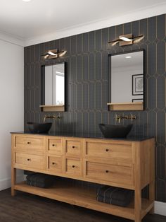 a bathroom vanity with two sinks and mirrors on the wall next to a wooden cabinet