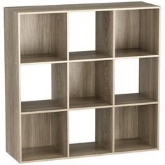 an open bookcase with multiple compartments on the front and sides, in grey oak