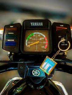 a close up of a speedometer on a motorcycle