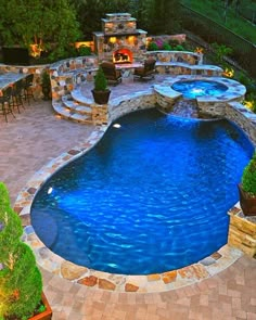 an outdoor swimming pool surrounded by patio furniture and landscaping features is shown in this screenshot