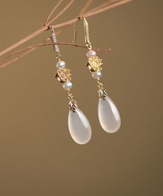 Elevate your ensemble with the opulent charm of the Simple White Sterling Silver Overgild Pearl Drop Earrings. These stunning earrings boast a lustrous sterling silver design, enhanced with a gleaming gilded finish and adorned with luminous pearls. As a finishing touch, the elegant drop design adds a touch of sophistication and luxury to any outfit.Made of fine Sterling Silver Overgild Pearl.Measurement: 6cm/2.34" * 2.1cm/0.819". Matches easily with daily hairstyle. dresses & Shirts Elegant Pendant Earrings For Anniversary, Luxury Crystal Drop Earrings, Gold Pendant Earrings With Elegant Design, Exquisite Gold Drop Earrings, Exquisite Silver Drop Earrings, Exquisite Pierced Dangle Earrings, Exquisite Single Drop Earring, Elegant Jewelry Pendant With Ear Wire, Elegant Pendant Jewelry With Ear Wire