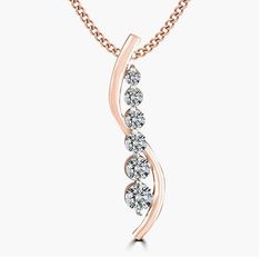 This stunning pendant for women is a true masterpiece of craftsmanship. Made with 14K rose gold, it is both elegant and durable. The pendant features a unique design that showcases a variety of moissanite stones, with each measuring 2.5mm, 3mm, 3.25mm, 3.5mm, 4mm and 4.5mm in size, and round in shape, with a total weight of 0.90 carats. The sparkling moissanites are set in an intricate design that will make this pendant a perfect choice for any occasion. The unique rose gold color adds a touch of warmth and femininity to this pendant that is perfect for everyday wear or special events. The Multi-Size of Moissanite give the pendant a unique and modern look. This pendant is sure to become a treasured piece of jewelry that will be cherished for years to come. There will be 6 stones in the pen Rose Gold Top, Gold Necklace For Women, Porcelain Necklace, Moissanite Pendant, Gold Bar Necklace, Pendant For Women, Gold Necklace Women, Unique Diamonds, Gemstone Necklace Pendant