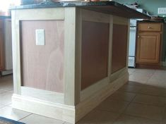 a kitchen island made out of plywood