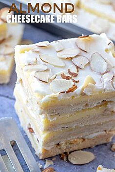 almond cheesecake bars stacked on top of each other