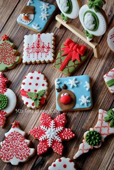 decorated christmas cookies on a wooden table