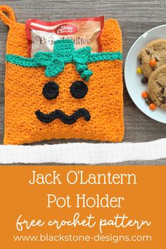 jack o lantern pot holder with cookies and candy