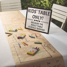 a kid's table is decorated with crayons and a sign that says kids'table only because the adult table is really boring