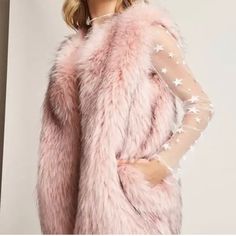 Brand New - Shaci (Xs) - Pink Faux Fur Vest- Jacket Purchased At Bloomingdale’s Outlet! Interior Lined With Satin Light Pink Fabric Built With 4 Clasps To Button To Keep You Extra Warm. Light Pink Fur With Black Tips Throughout. Very Feminine! Pink Faux Fur Lined Winter Outerwear, Pink Winter Outerwear With Faux Fur Lining, Pink Fur Coat With Faux Fur Lining For Winter, Pink Faux Fur Lined Coat For Winter, Pink Faux Fur Coat For Winter, Fitted Pink Fur Coat For Fall, Winter Outerwear With Pockets For Parties, Winter Party Outerwear With Pockets, Spring Faux Fur Outerwear With Pockets