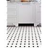 a dog is sitting in the middle of a kitchen with black and white floor tiles