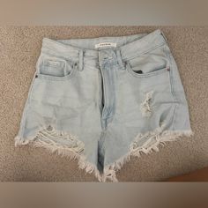 These Are A Light Blue Colored Pair Of Ripped Denim Shorts. They’re From Pacsun And Cute Rips In The Front. The Tag Is Off But Never Worn. It Is A Size 24 And High Waisted With A Zipper Ripped Light Wash Jean Shorts For Day Out, Light Wash Ripped Jean Shorts For Day Out, Day Out Light Wash Ripped Jean Shorts, Summer Denim Jeans With Frayed Hem, Summer Jeans With Frayed Hem, Summer Cutoff Jeans For A Day Out, Light Wash Ripped Bottoms For Day Out, Summer Ripped Medium Wash Jeans, Light Wash High Waist Summer Jeans