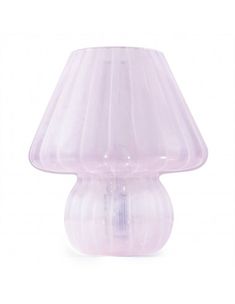 a pink lamp with a white shade on the top and bottom part of it's bulb