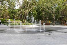 there are many water fountains in the park