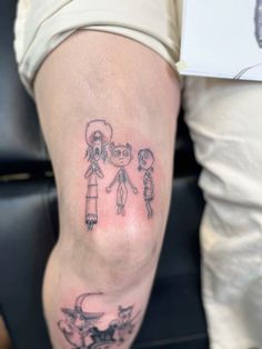 a person with a tattoo on their leg