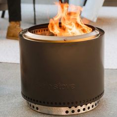 a stove that has some fire inside of it