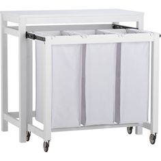 a white kitchen cart with two bins on wheels