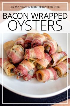 bacon wrapped oysters on a white plate with text overlay that reads, get the recipe at dinner