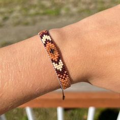 Handmade beaded loom bracelet  Adjustable closure Everyday Brown Beaded Friendship Bracelets, Beaded Brown Friendship Bracelets As Gift, Brown Beaded Friendship Bracelets As Gift, Adjustable Brown Beaded Friendship Bracelets, Brown Friendship Bracelets With Tiny Round Beads, Resizable Brown Beaded Bracelets For Festivals, Adjustable Brown Handwoven Beaded Bracelets, Brown Beaded Friendship Bracelets With Round Beads, Brown Beaded Round Bead Friendship Bracelets