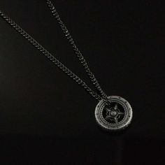 Calling all time travelers! Drawing inspiration from the ancient Italian aesthetics, our Roman Sundial necklace elevates your look with its classic design inspired by the Roman era. A timeless touch of elegance to your fashion expeditions. Included, Amulet and Chain Stainless Steel with Graphite PVD Nickel Free and Lead Free Roman Sundial Amulet, 1" Length Curb Chain, 24" Length Vintage Compass Pendant Jewelry, Spiritual Compass Pendant Necklace, Oxidized Stainless Steel Medallion Necklace, Elegant Stainless Steel Medallion Necklace, Vintage Compass Design Round Pendant Jewelry, Vintage Compass Design Round Necklace, Vintage Round Compass Pendant Jewelry, Amulet Style Compass Pendant Necklace, Timeless Silver Medallion Necklaces