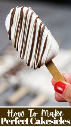 a hand holding a chocolate covered dessert on a stick with the words how to make perfect cakes