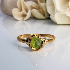 ♡ Raw Peridot Ring There is passion and love built into every inch of Stone Orchard’s handmade gemstone jewelry. Each raw stone is mindfully selected and each piece is skillfully crafted to create distinctive, intriguing pieces that captivate a room with their rare beauty and illuminating crystals. ♡ MATERIAL OPTIONS ❀ Sterling Silver: Gems are set on a sterling silver band, the bezel is electroformed copper, and the entire ring is plated in Rhodium. ❀ Dark Silver: Gems are set on a sterling sil Spiritual Peridot Jewelry With Gemstone Accents, Spiritual Peridot Jewelry With Gemstone, Spiritual Peridot Gemstone Jewelry, Peridot Gemstone Stackable Rings As Gift, Peridot Ring Gemstone Gift, Peridot Gemstone Ring Gift, Peridot Open Ring Jewelry Gift, Peridot Open Ring Jewelry For Gifts, Peridot Birthstone Ring Jewelry