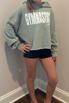 Stay cozy and in style with this soft trendy cropped hoodie designed for active girls. Whether you're heading to practice or rehearsal, dressing preppy for school, or lounging at home, this hoodie offers the perfect combination of comfort and fashion. The cropped fit provides a trendy look, while the soft fabric ensures a gentle touch against your skin. Elevate your athleisure look with this must-have hoodie that effortlessly combines functionality and style. Perfect for those who love to stay active while looking chic... all day!  First 25 buyers get early bird pricing. Preppy Dresses, Stay Active, Gentle Touch, Early Bird, Stay Cozy, Hoodie Design, Cropped Hoodie, Soft Fabric, Athleisure