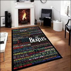 the beatles rug is in front of a fireplace with a clock on top of it