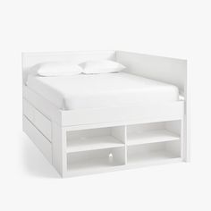 a white bed with drawers underneath it on a white background, there is no image here to provide a caption for