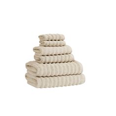 six white towels stacked on top of each other